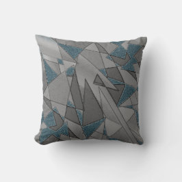 Graue dreieckige Ausschnitte auf blauem Hintergrun Kissen