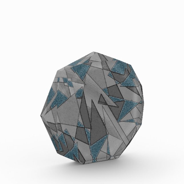 Graue Dreiecksausschnitte mit groben dunkelblauen  Fotoblock (Links)