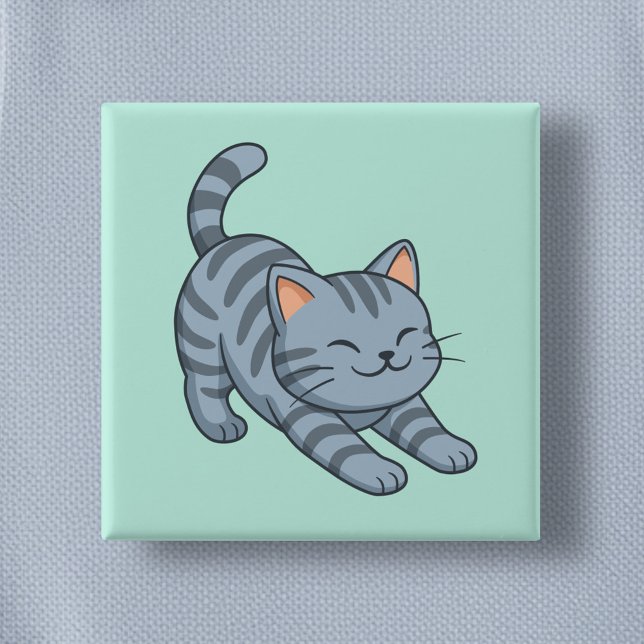 Graue getigerte Katze beim Strecken in Grün Button (Von Creator hochgeladen)
