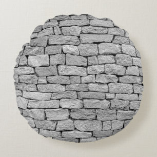 Graue Steinmauer, abstrakter Hintergrund. Rundes Kissen