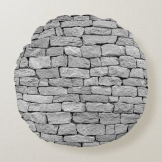 Graue Steinmauer, abstrakter Hintergrund. Rundes Kissen