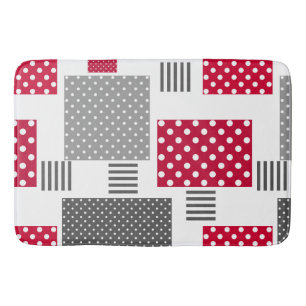 Graues rotes Polka-Dot-Patchwork auf weißem Hinter Badematte