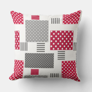 Graues rotes Polka-Dot-Patchwork auf weißem Hinter Kissen
