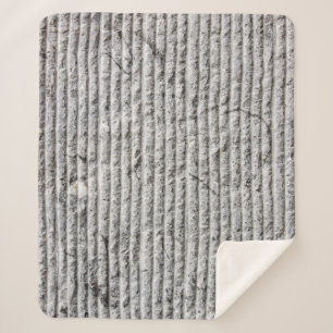 Grausteinfarbene Wandstruktur. Textur der Steinmau Sherpadecke