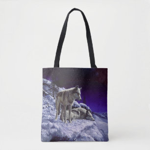 Grauwölfe im Winterschnee in der Nacht Tasche