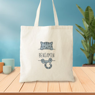 Gray Tabby Cat Peeking hinter Individuelle Name Tragetasche