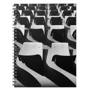 Grayscale photography of chairs with no people notizblock