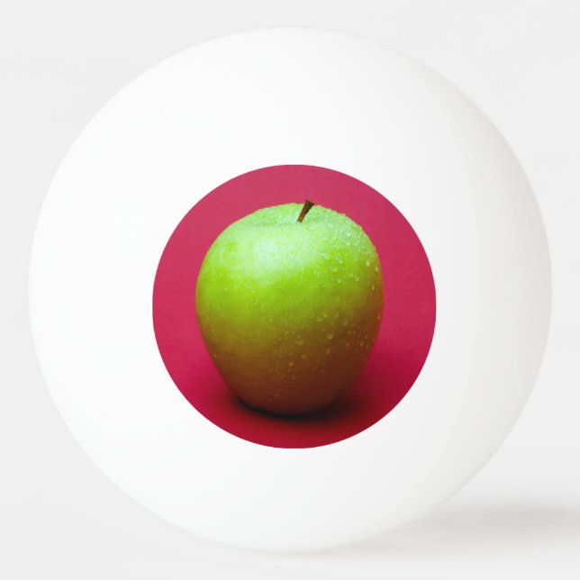 Green apple on red background tischtennisball (Vorderseite)