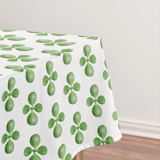 Green Jade Tree Blätter auf Weiß Tischdecke (Beispiel)