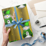 Green Snowman on Gold Christmas Geschenkpapier<br><div class="desc">A very festive golden Christmas wrapping paper featuring a whimsical pattern of snowmen clad in green velvet,  wearing top hat and vest with golden stars and green ribbons all set on a beautiful golden background,  to add a cute,  colorful and joyful touch to your gifts this year.</div>