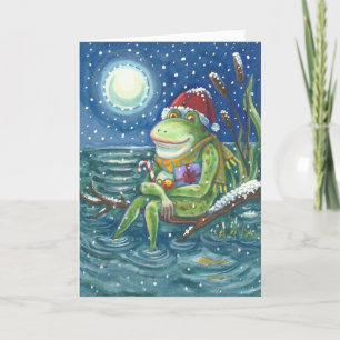 Grenouille sur le journal NOËL CARTE DE SALUTION
