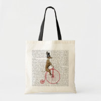 Greyhound auf Red Penny Farthing Bike