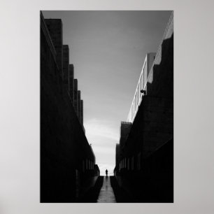 GREYSCALE PHOTO OF PATHWAY BETWEEN BUILDINGS POSTER