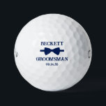 Groomsman Blue Bow Tie Golfball<br><div class="desc">These golf balls are a great favor for the groomsman in your wedding. They feature a blue bow tie with the groomsman's name above it in a modern CAP font and the word Groomsman along with the wedding date below. They'd be great for a bachelor party or weekend. The job...</div>