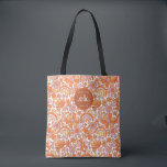 Groovy Retro Orange Florals Monogram Tasche<br><div class="desc">Die Groovy Retro Orange Florals Monogram Tote Bag ist ein stilvolles und funktionelles Accessoire, das für jeden Anlass perfekt geeignet ist. Mit seinem fett orangefarbenen Blumenmuster und dem personalisierten Monogramm verleiht diese Tasche Ihrem Kleiderschrank einen lebendigen Pop. Diese Tasche ist groß genug, um alle Ihre wesentlichen Dinge zu tragen, egal...</div>