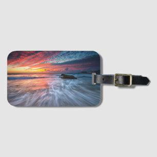 Großartiger Steinstrand des Sonnenuntergang- , EL Gepäckanhänger