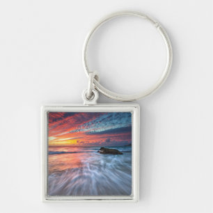 Großartiger Steinstrand des Sonnenuntergang- , EL Schlüsselanhänger