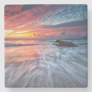 Großartiger Steinstrand des Sonnenuntergang- , EL Steinuntersetzer