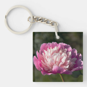 Große Blume aus rosafarbenem Pinien am Frühlingsta Schlüsselanhänger
