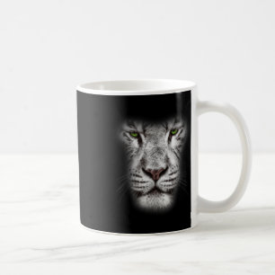 Große Löwenkatzengesicht mit dunkelgrünen Augen, v Kaffeetasse