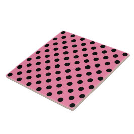 Große schwarze Polka-Punkte auf heiß rosa Fliese