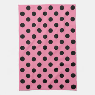 Große schwarze Polka Punkte auf heißen rosa Küchentuch