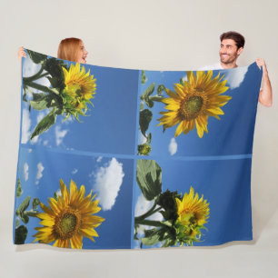 große Sonnenblume strahlt gelb blau Himmel weiß we Fleecedecke