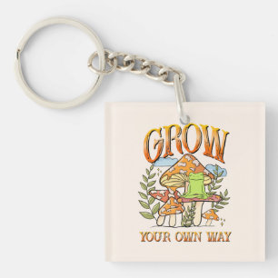"Grow your own way"   Frosch und Pilze vermitteln Schlüsselanhänger