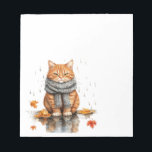 Grumpy Orange Cat in Rain Notizblock<br><div class="desc">Grumpy Orange Cat in Rain</div>