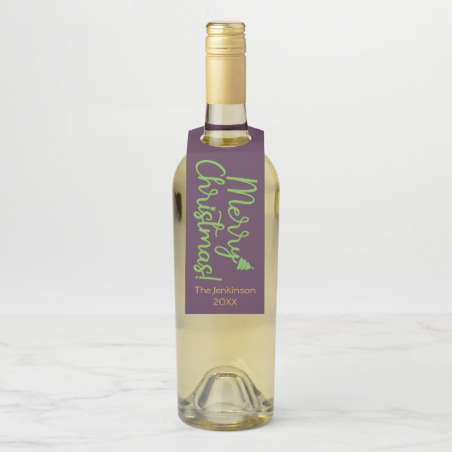 Grün frohe Weihnachtstypografie über Violet Flaschenanhänger (Auf Flasche)