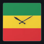 Grün, Gold (gelb) und rote Farbflagge Quadratische Wanduhr<br><div class="desc">Grün-,  des Gold-(Gelb) u. Fahnen-Farben. 

Vintage alte Schulalternative angesagte Hopfent-shirts Kleid,  Hüte,  Aufkleber,  intelligente Telefon-Hüllen und mehr.</div>