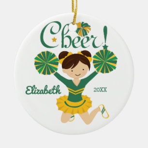 Grün-goldene Cheerleaderin mit dunklen Haaren als Keramikornament