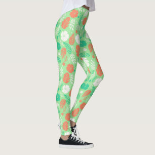 Grün- und Orangefarbenes tropisches Blattmuster Leggings
