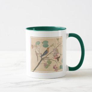 Grunddrossel und Motte auf einer Tasse