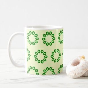 Grüne Blätter in einem gelben Kreis Kaffeetasse