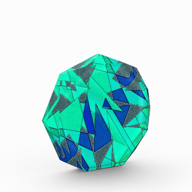 Grüne dreieckige Ausschnitte auf blauem Hintergrun Fotoblock (Links)