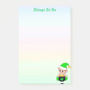 Grüne Elf- und Goldmünzen in Pastellfarben Liste Post-it Klebezettel