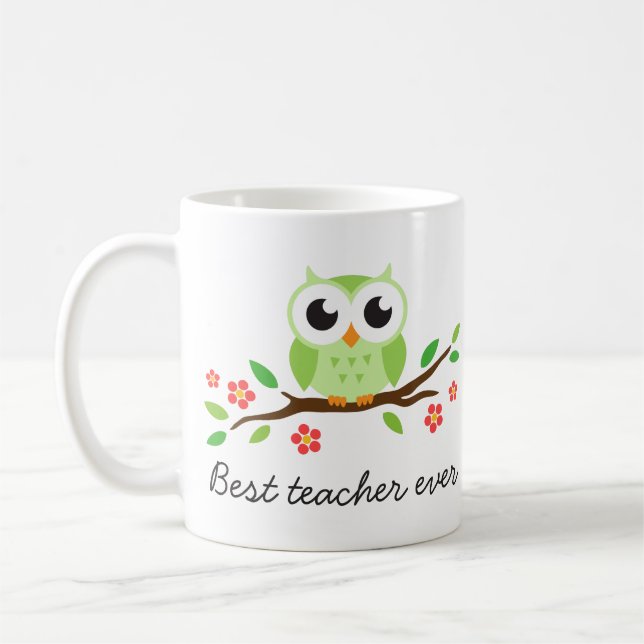 Grüne Eule auf Lehrer-Gewohnheitstext der Kaffeetasse (Links)
