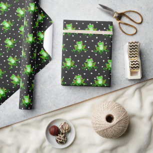 Grüne Frösche auf Punkten Geschenkpapier