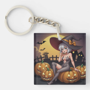 Grüne Halloween-Hexe auf Kürbislaterne Schlüsselanhänger