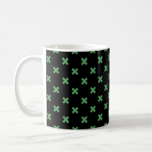 Grüne Kreuzstiche auf schwarz Kaffeetasse