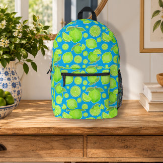 Grüne Limetten auf leuchtend blauem Zitrusfruchtmu Bedruckter Rucksack