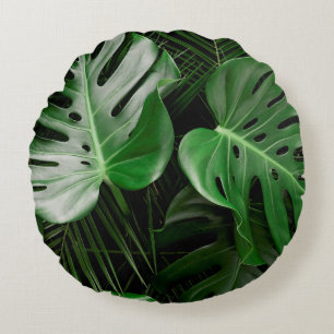 Grüne Monstera-Blätter und Blätter aus Palmen Rundes Kissen
