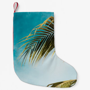 Grüne Palme unter blauem Himmel Kleiner Weihnachtsstrumpf
