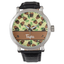 Grüne Pflanze aus Terrakotta auf gelb Armbanduhr