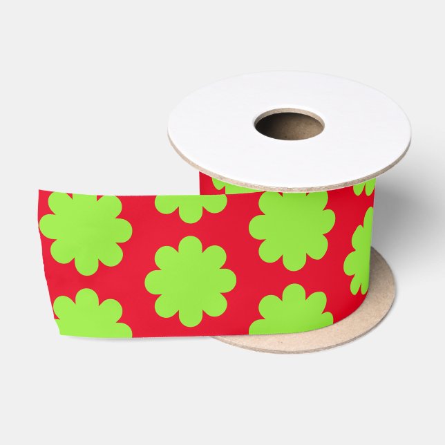 Grüne Retro-Blume über das rote Band Satinband (Spule)
