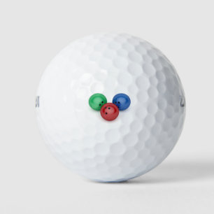 Grüne, rote und blaue Bowlingkugeln Golfball