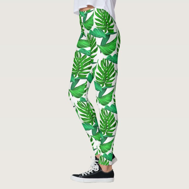Grüne und weiße Palmenblätter, tropischer Dschunge Leggings (Links)