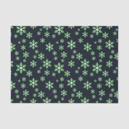 Grüne und weiße Schneeflocken mit blauem Hintergru Seidenpapier