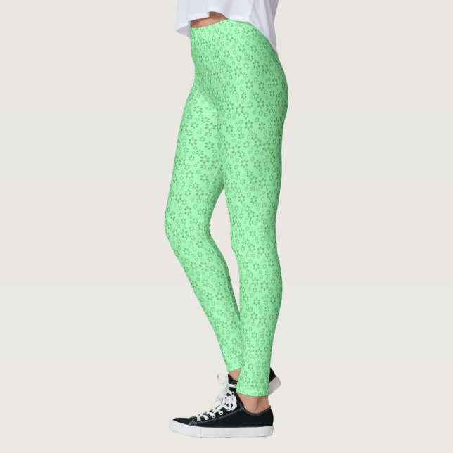 Grüne und weiße Schneeflocken mit hellgrünen Leggings (Links)